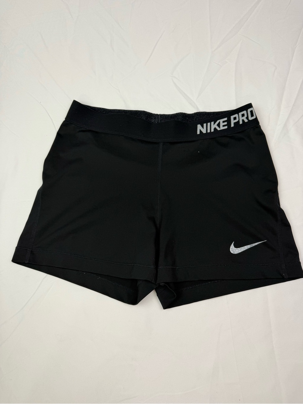Nike Women's Black Athletic Pro Shorts with Silver Swoosh